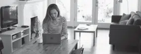 Woman working from home on a laptop